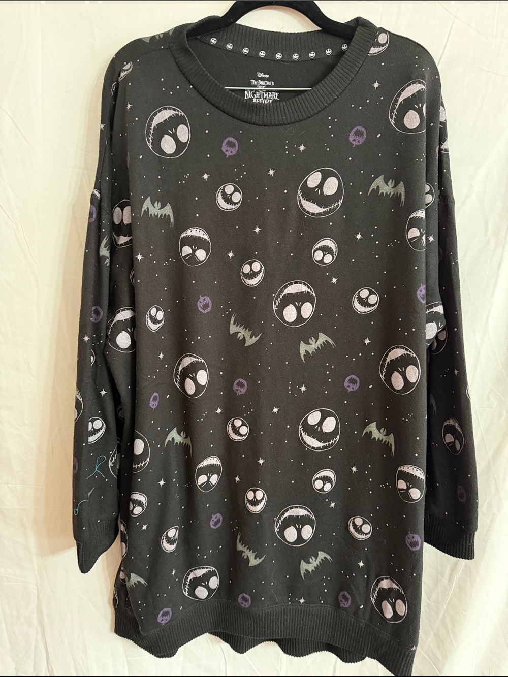 Disney Black Crewneck Sweater with White & Purple Jack Skellington Faces